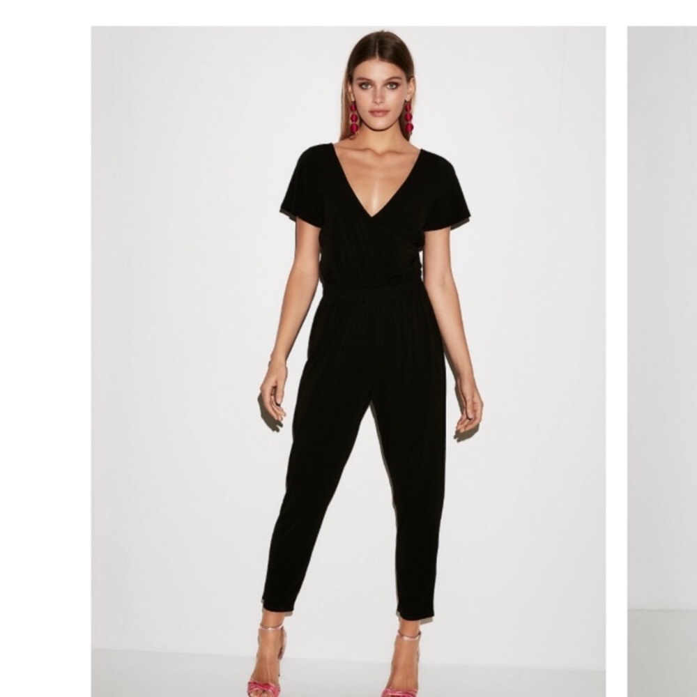 Black surplice flutter sleeve jumpsuit